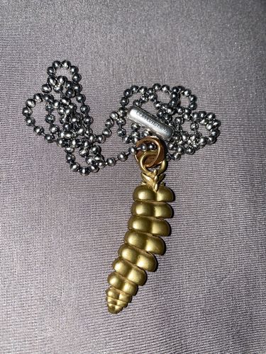 Customer photo review of Brass Rattlesnake Tail Pendant