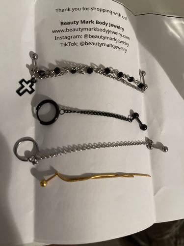 Customer photo review of Cross with Double Beaded Chain Dangle Cartilage/Tragus Ring