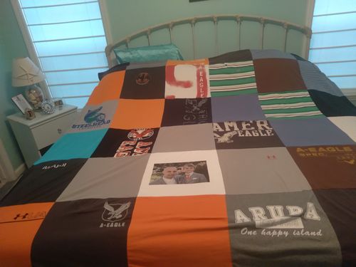 T-shirt quilt with travel, sports themes by kathleen from DE