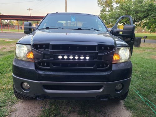 Customer photo review of Armor Grille w/Off-Road Lights, Replaceable Letters- Matte Black for 2009-2014 Ford F150