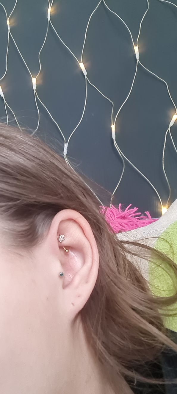 Customer photo review of Flower Rook Piercing | Chirurgenstahl