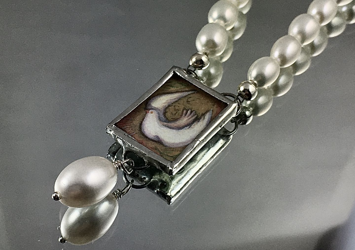 Customer photo review of Holy Spirit Dove Rosary Centerpiece