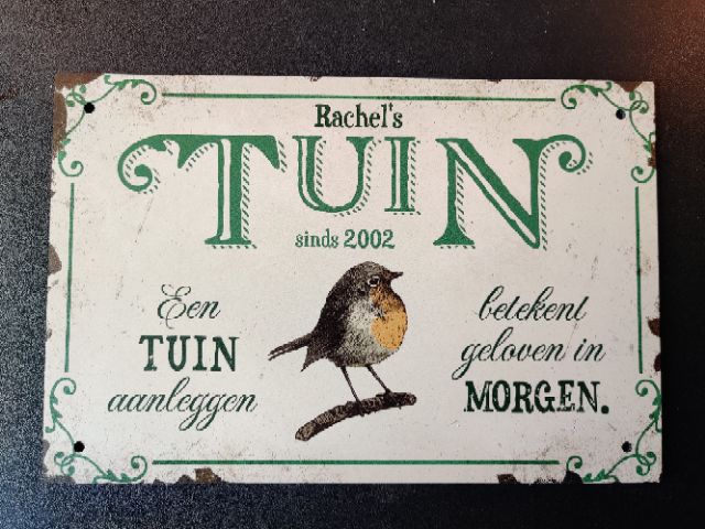 Customer photo review of Tuingeluk - Tuin-deurbord