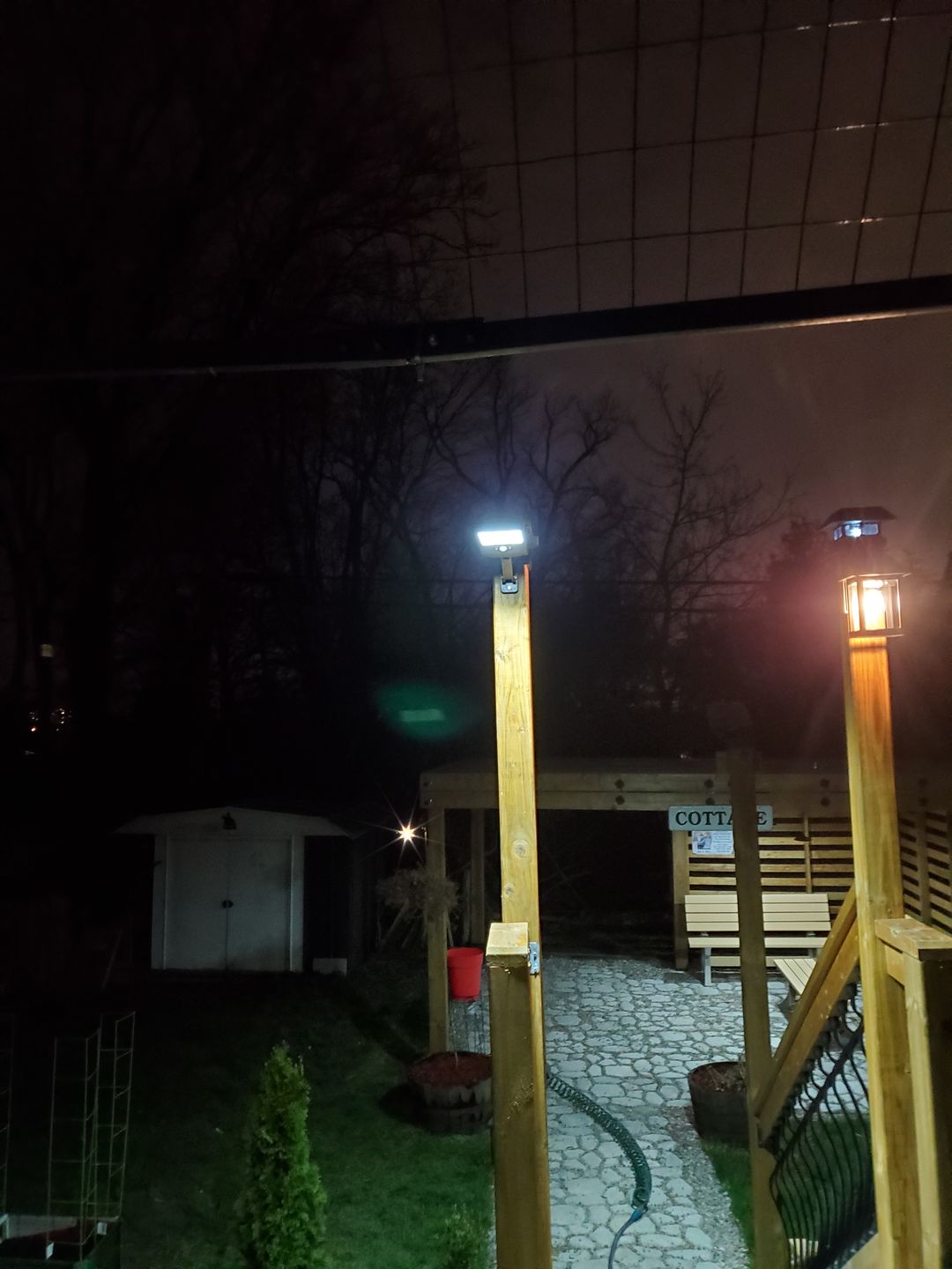 Customer photo review of BigM 100W LED COB Mini Solar Street Flood Light with Motion Sensor & Remote for Your Backyard, Garden, Cottage, Farm, Barn, Parking Lot, Playground