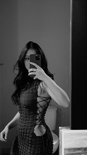 Customer photo review of Sleeveless high neck lace up side mini dress