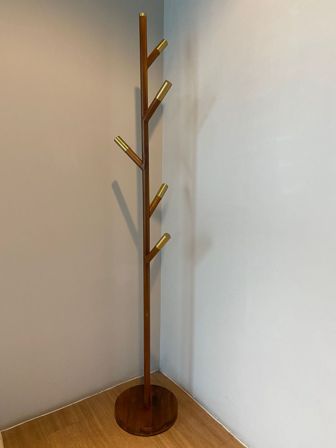 Customer photo review of Minimalist Teak Coat Rack – Branch Design