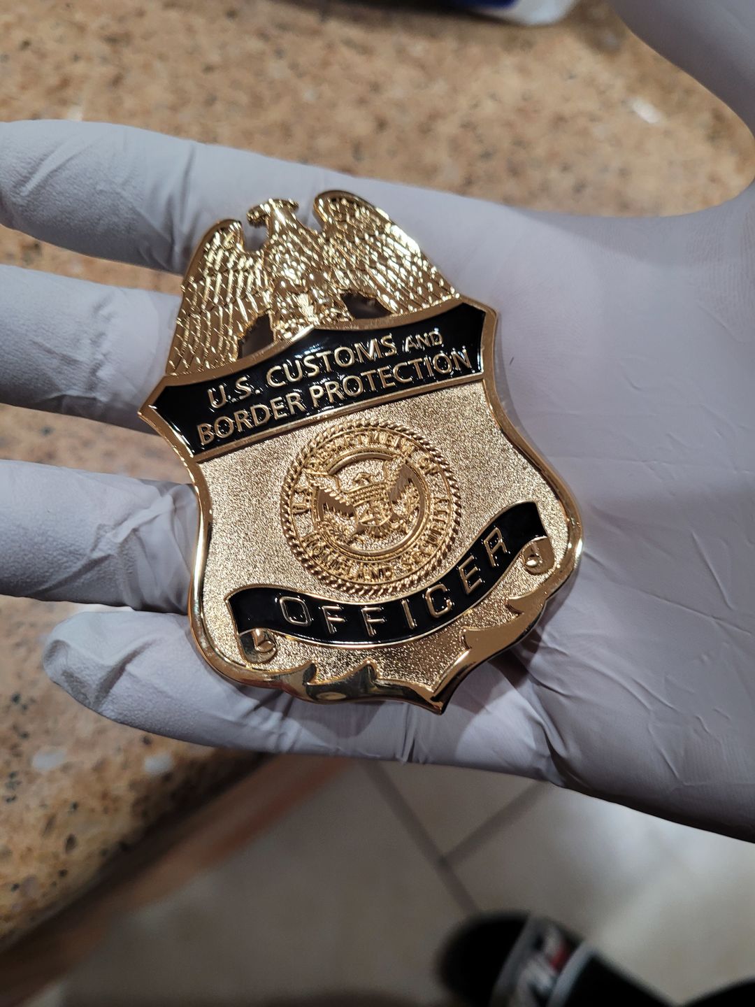 Customer photo review of US CBP Officer Customs and Border Protection Badge Solid Copper Replica Movie Props