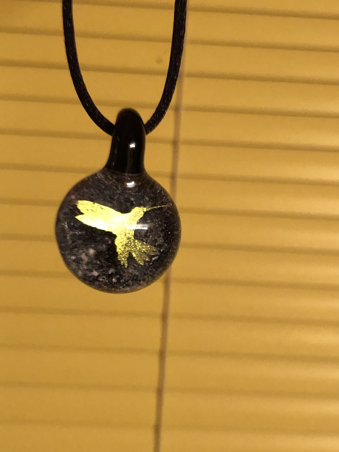 Customer photo review of Hummingbird Hologram Pendant with Infused Cremation Ash