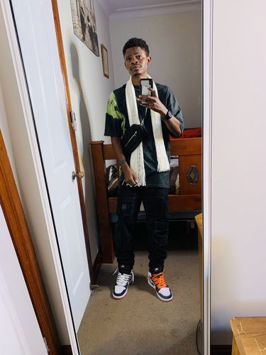 Customer photo review of Nike Air Jordan 1 Retro High OG 'Electro Orange'