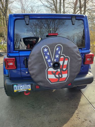 Customer photo review of American Flag Peace Sign Spare Tire Cover