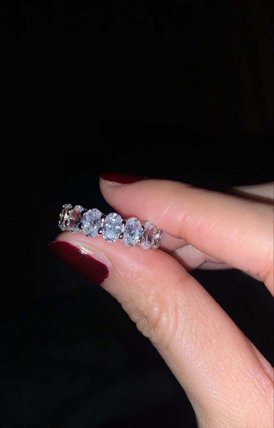 Customer photo review of Louily Eternity 5 Ct Emerald Cut Women's Wedding Band In Sterling Silver
