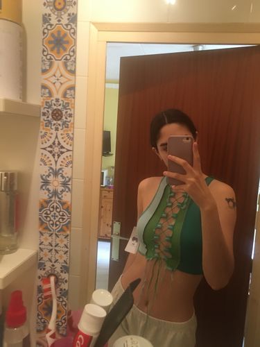 Customer photo review of Sleeveless sheer lace up crop top - Final Sale