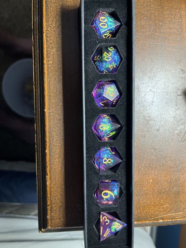 Customer photo review of Sharp Edge Purple Glitter Resin DnD Dice Set All Number Dice