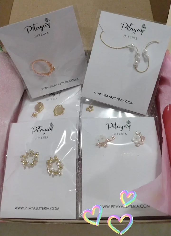 Customer photo review of Aretes de Saturno de Ópalo