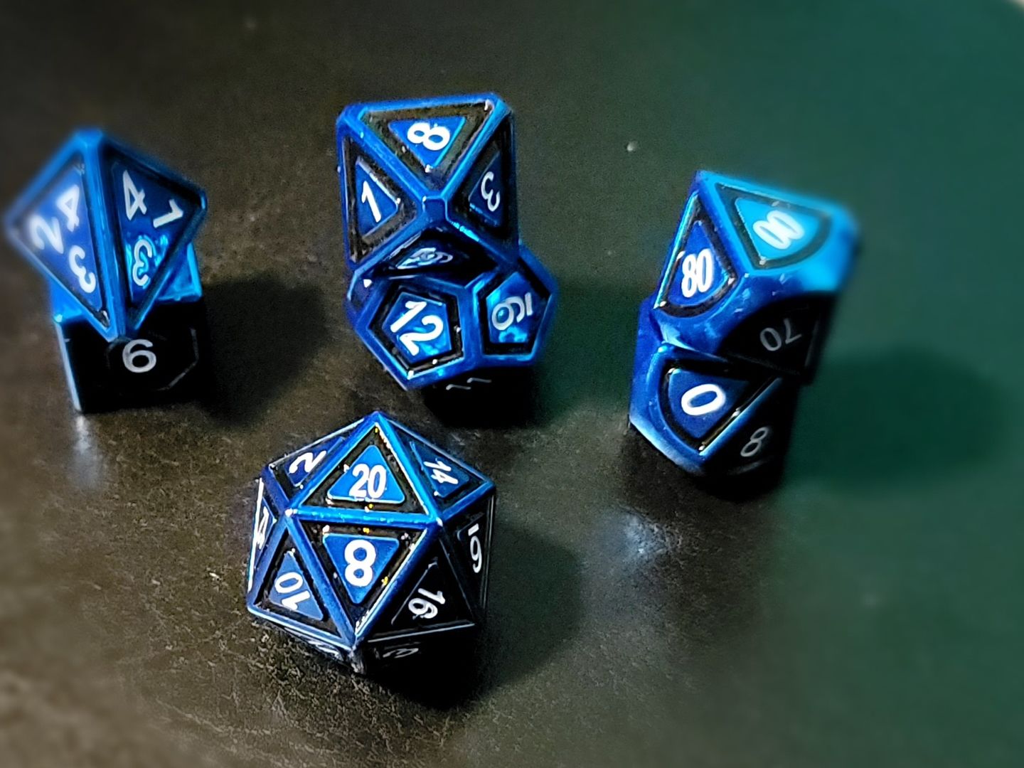 Customer photo review of CLERIC'S DOMAIN BLACK AND BLUE METAL DICE