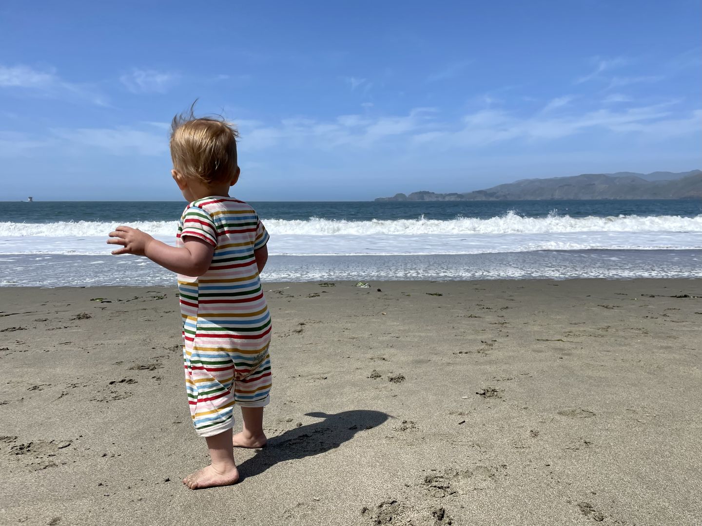 Customer photo review of Rainbow Striped Organic Romper Playsuit