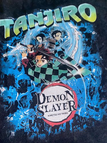 Customer photo review of Harajuku Style Vintage Washed Demon Slayer Oversized Tee