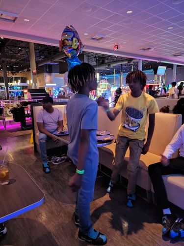 Customer photo review of Oreo Unisex Shirt Match Jordan 4 Lightning - Tour Yellow Tshirt