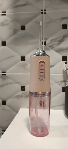 Customer photo review of HexoTeeth™ Portable Teeth Water Flosser Device