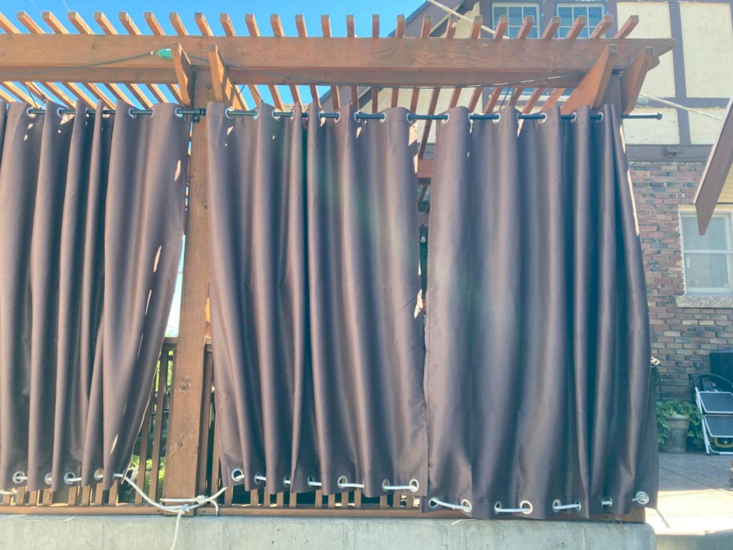 Customer photo review of Top & Bottom Grommet Windproof Outdoor Curtains for Patio 1 Panel