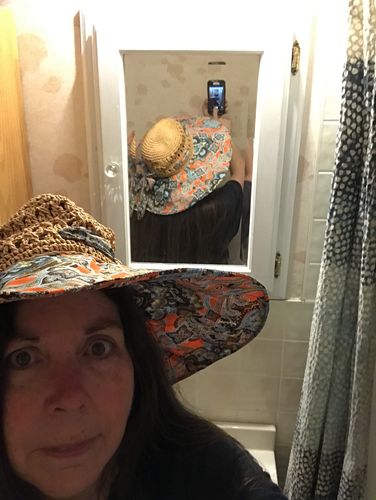 Customer photo review of Women Bowknot Travel Sun Protection Foldable Floral Straw Hat