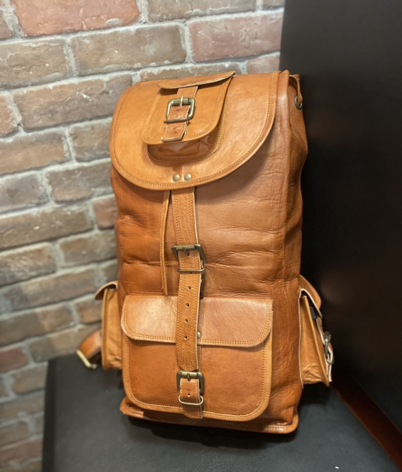 Customer photo review of Men's Leather Backpack for School, College, Hiking & Travel