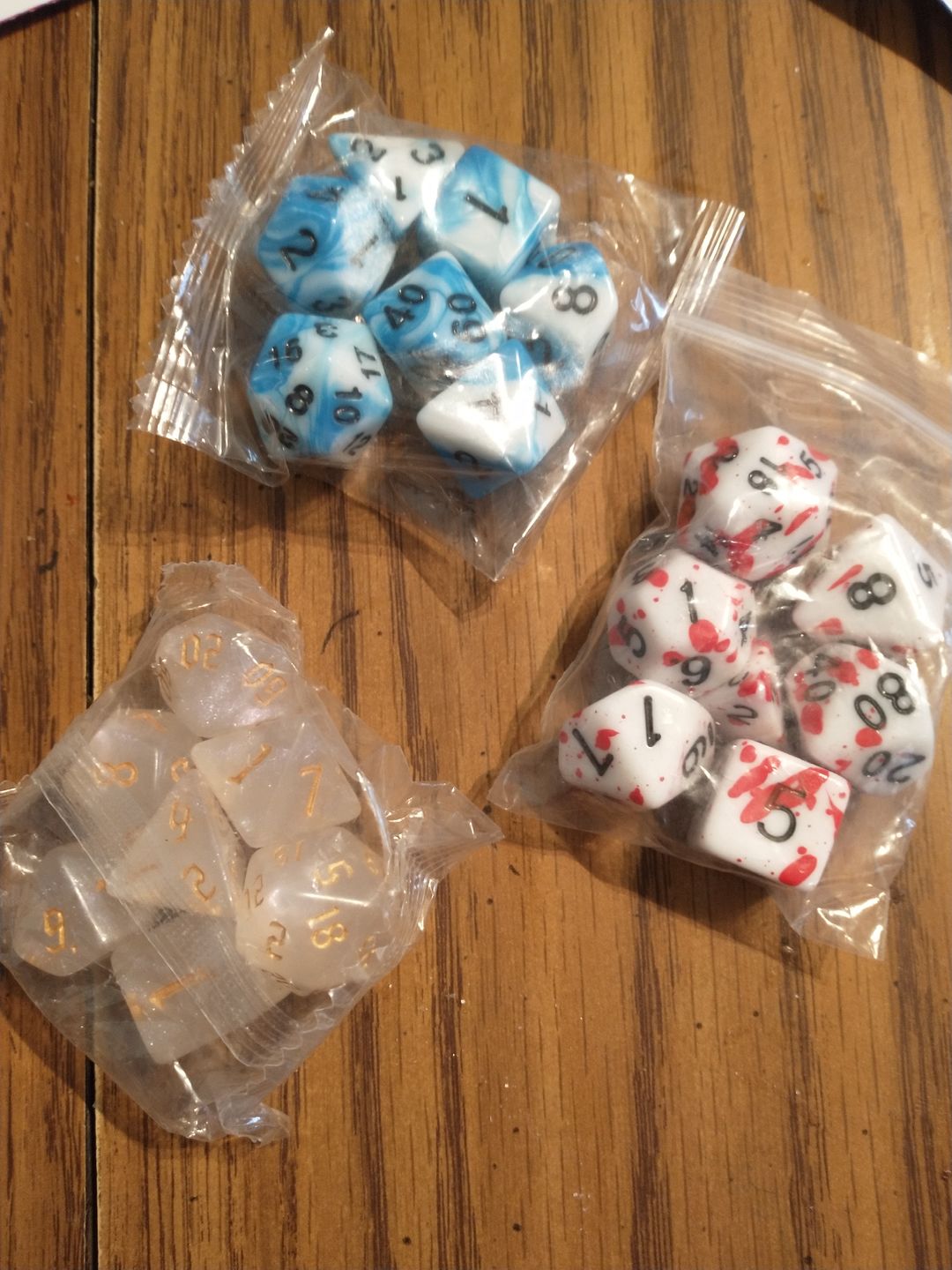 Customer photo review of 3 MYSTERY ACRYLIC DICE SETS