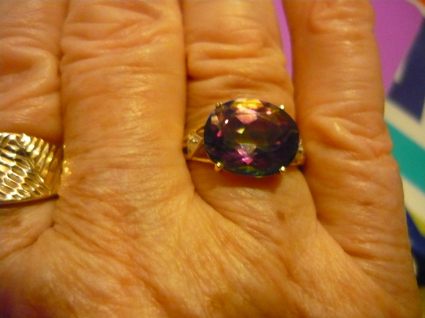 Customer photo review of 9ct Yellow Gold 5.20ct Mystic Topaz & Diamond Ring