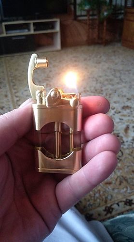 Customer photo review of Transparent Lift Arm Trench Lighter