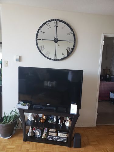 Customer photo review of 31.5" Oversized Rustic Mirrored Clock
