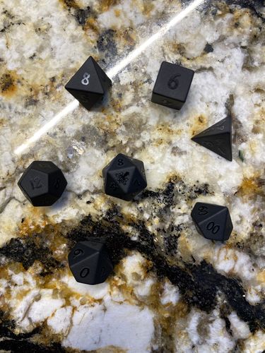 Customer photo review of Raised Obsidian Gemstone DnD Dice Set Squid Dice