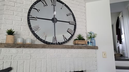 Customer photo review of 31.5" Oversized Rustic Mirrored Clock