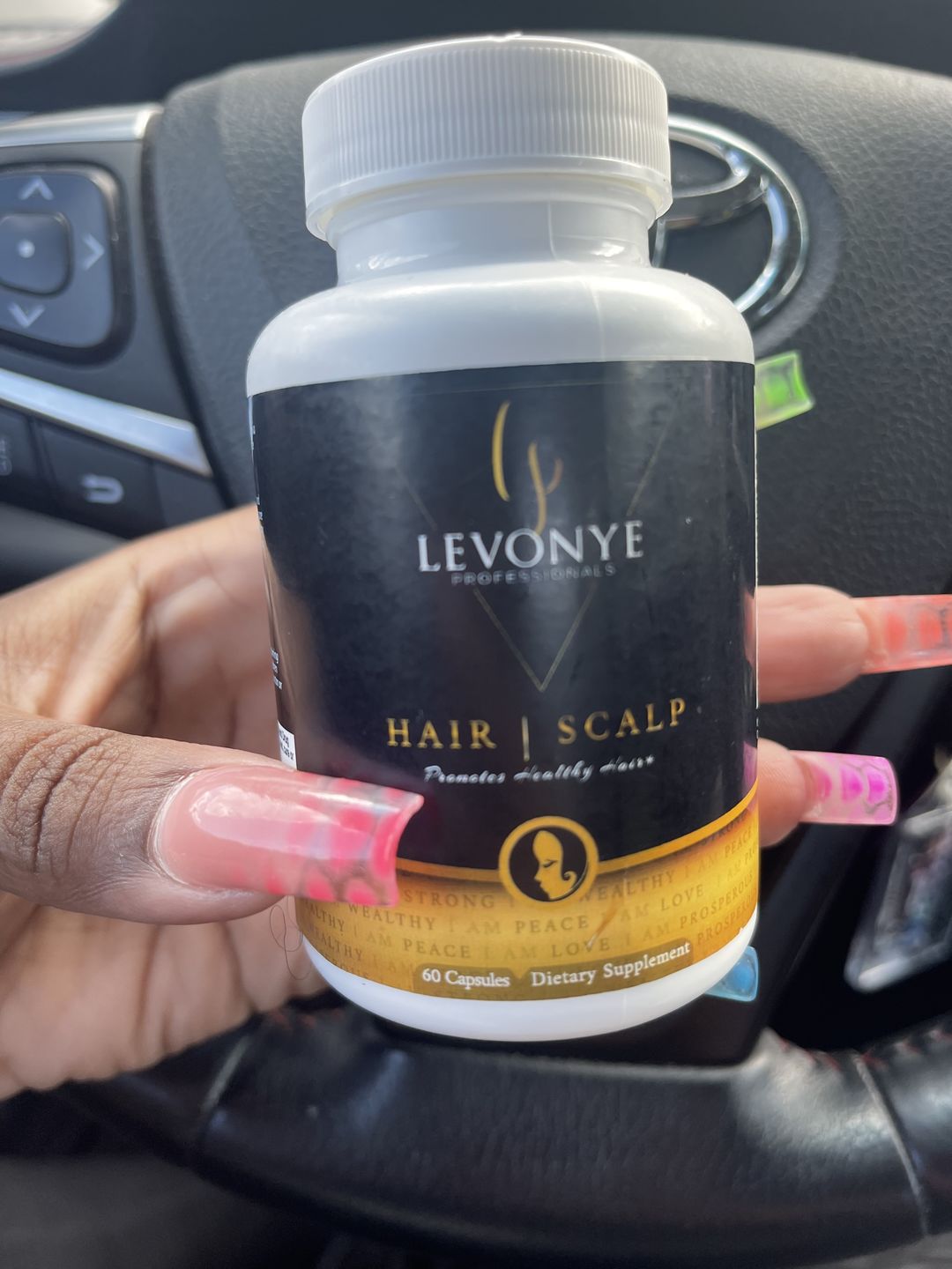Customer photo review of "I Am" Hair follicle Vitamins