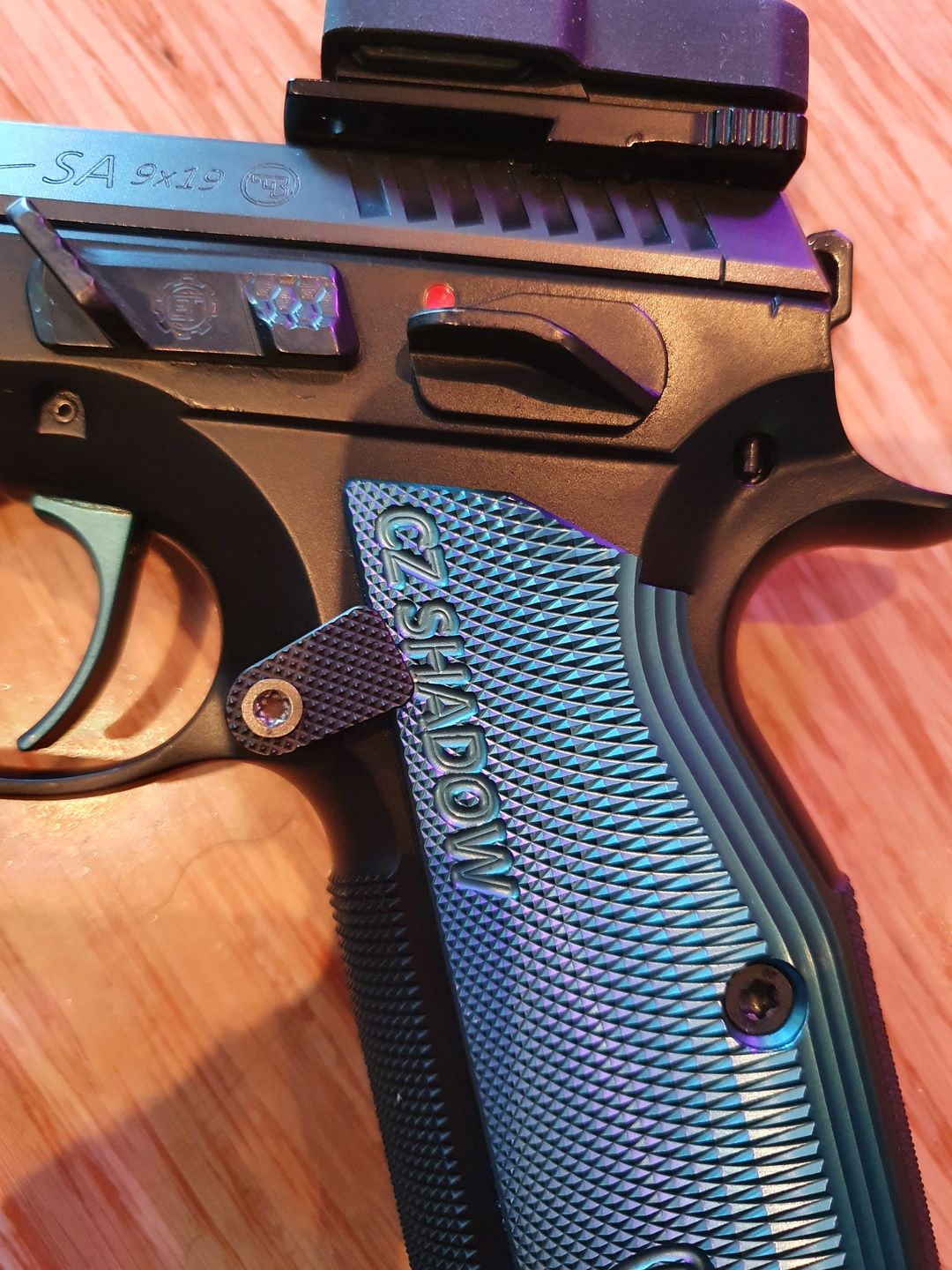 Customer photo review of CZ Shadow 2 Stainless Steel Extended Magazine Release Button