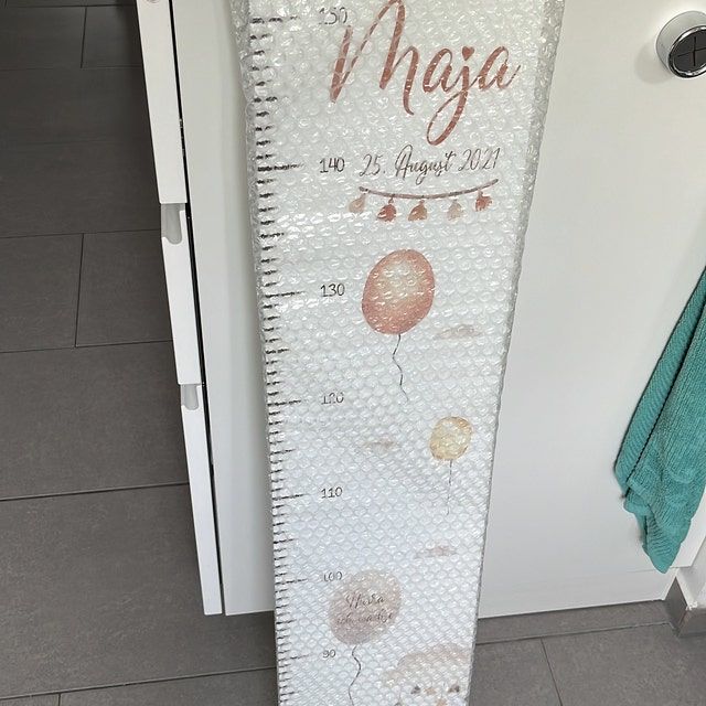 Customer photo review of Personalisierte Regenbogen Messlatte