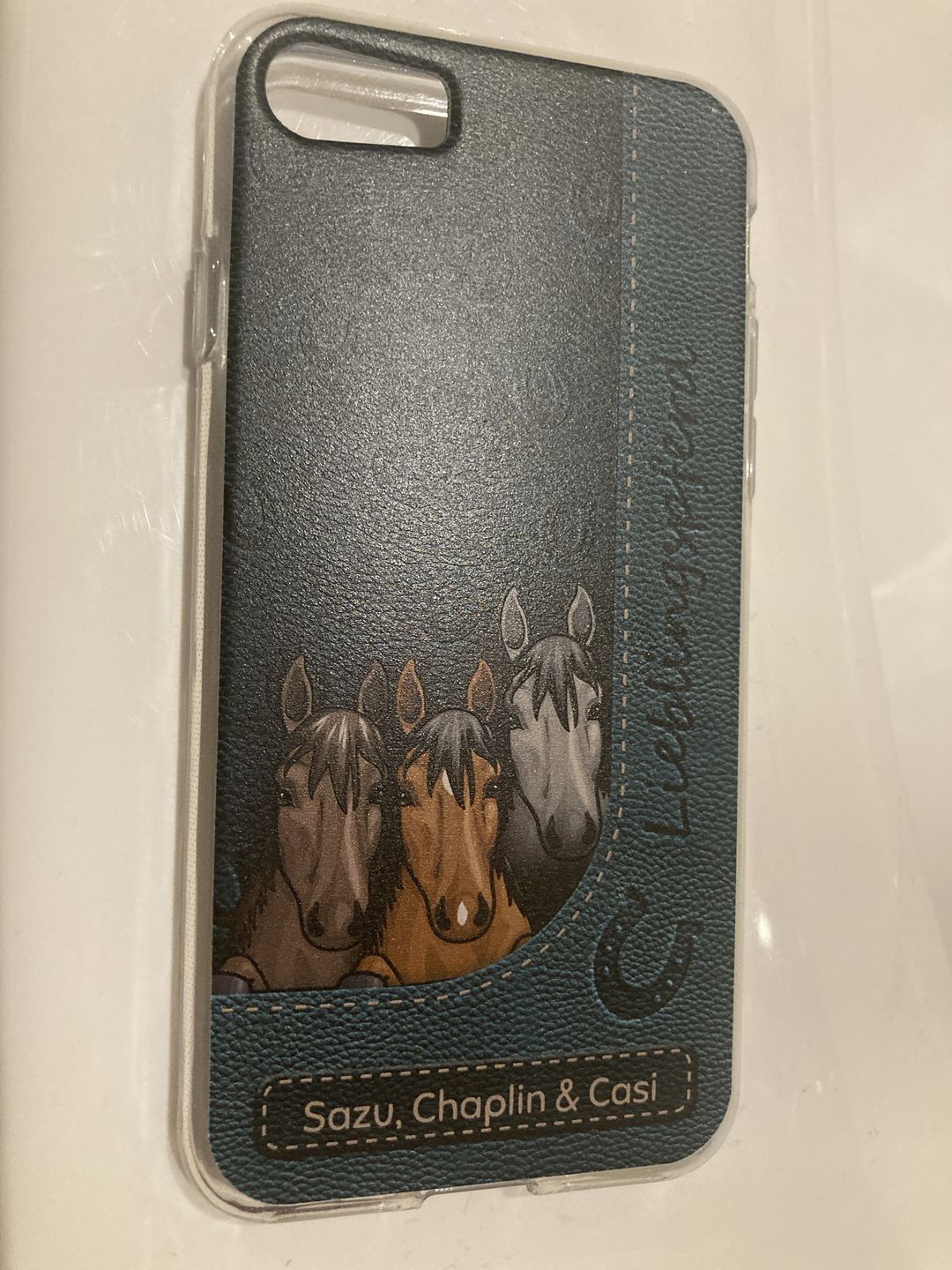 Customer photo review of Spähende Pferde Lederoptik - Individuelle Handyhülle