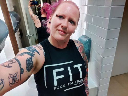 Customer photo review of Salty Savage™ Ladies "FIT FUCK, I’M TIRED" Flowy Crop Top | Black