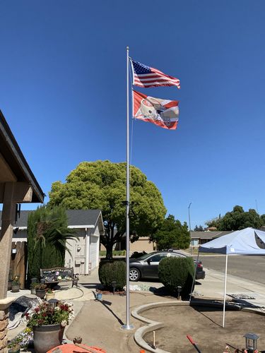 Customer photo review of 25 ft. Commercial Flagpole with External Rope Halyard Rated At 65 mph