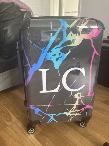 Customer photo review of Personalised Black Holographic Marble Initials Suitcase