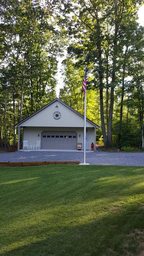 Customer photo review of 25 ft. Commercial Flagpole with External Rope Halyard Rated At 120+ mph