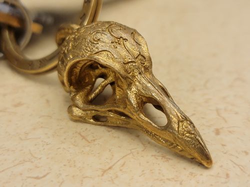 Customer photo review of Raven Skull Pendant