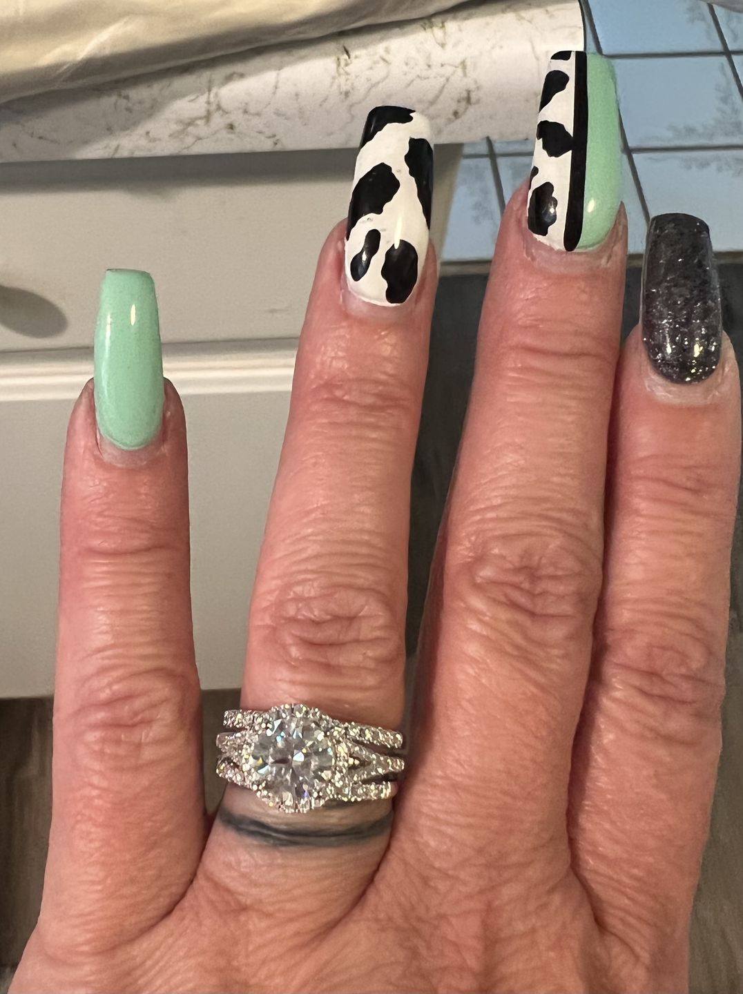 Customer photo review of Moissanite Split Shank Square Halo Pave Sterling Silver Wedding Ring