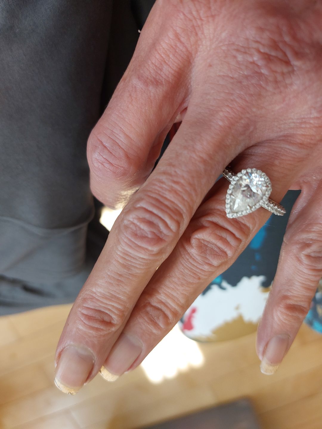 Customer photo review of Halo Pear Moissanite Triple Row Pave Engagement Ring