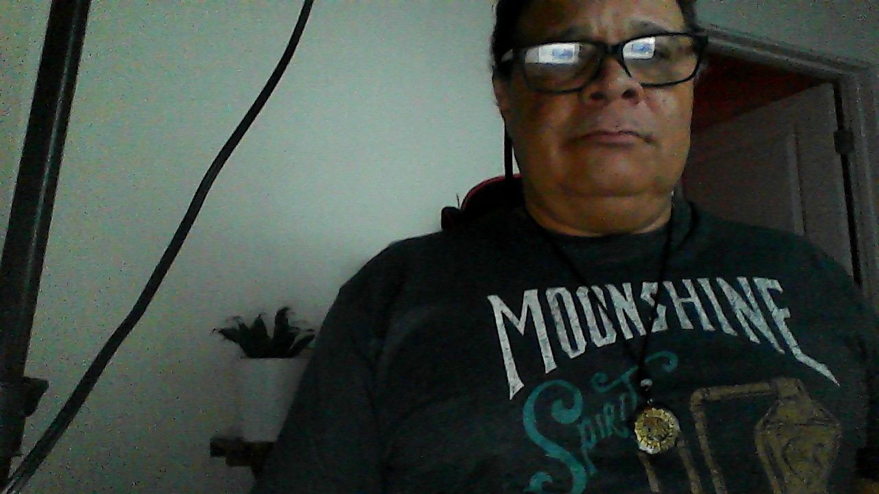 Customer photo review of Sacred Sri Yantra Orgonite Chakra Necklace