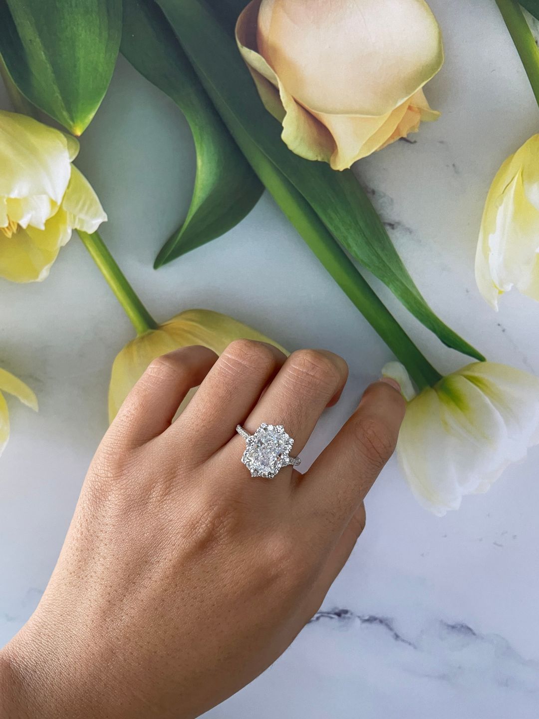 Customer photo review of S925 Gorgeous Halo 3.5Ct  Radiant Cut Simulated Diamond Engagement Ring In Sterling Silver
