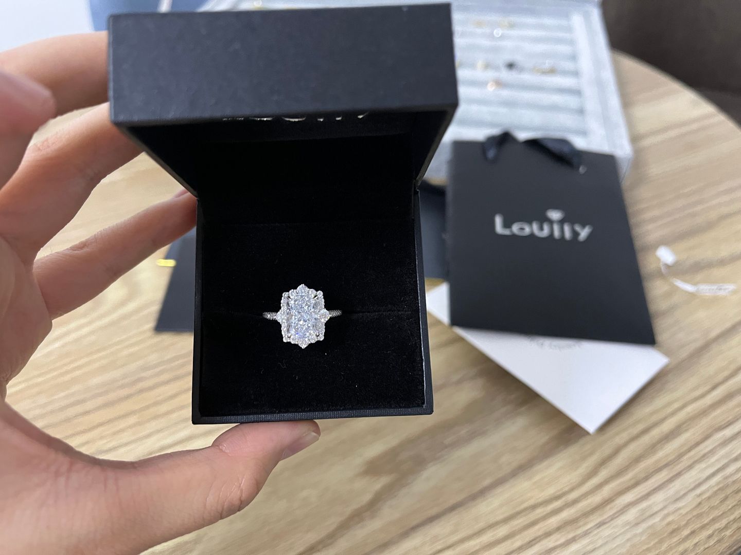 Customer photo review of S925 Gorgeous Halo 3.5Ct  Radiant Cut Simulated Diamond Engagement Ring In Sterling Silver
