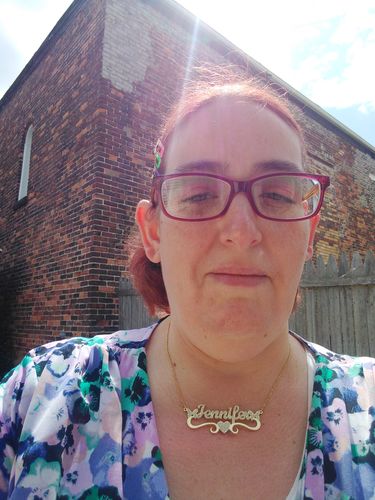 Customer photo review of Iced Out Butterfly Pendants