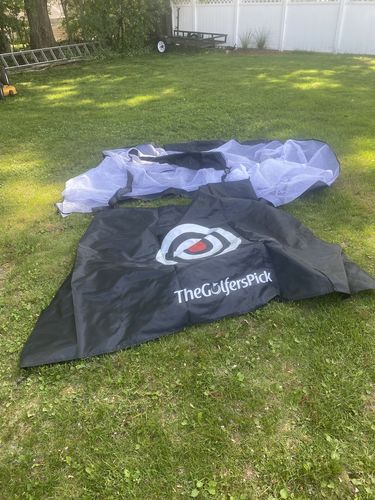 Customer photo review of Golf Practice Driving Net for Indoors and Outdoors | Tri-Turf Hitting Mat