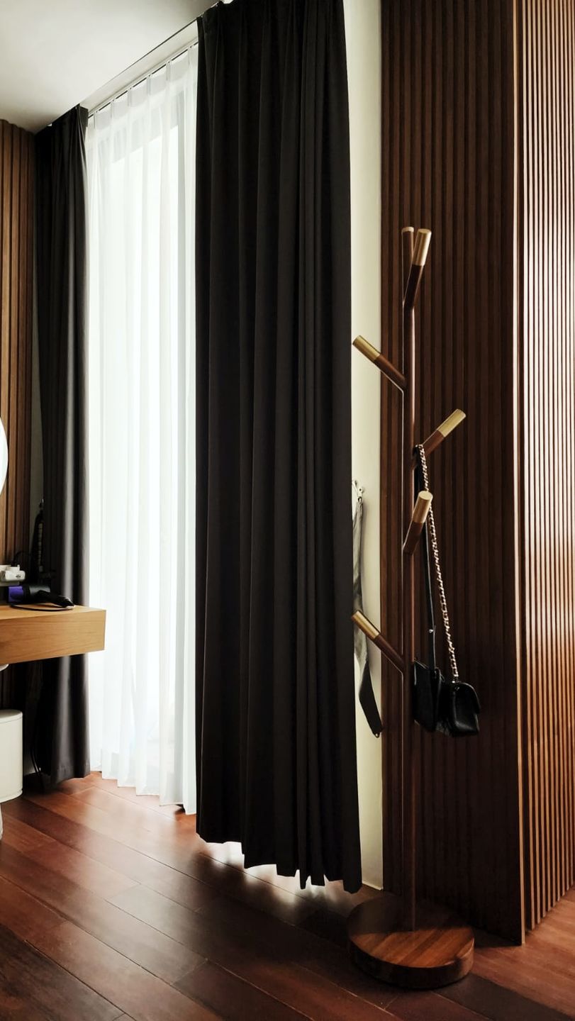 Customer photo review of Minimalist Teak Coat Rack – Branch Design
