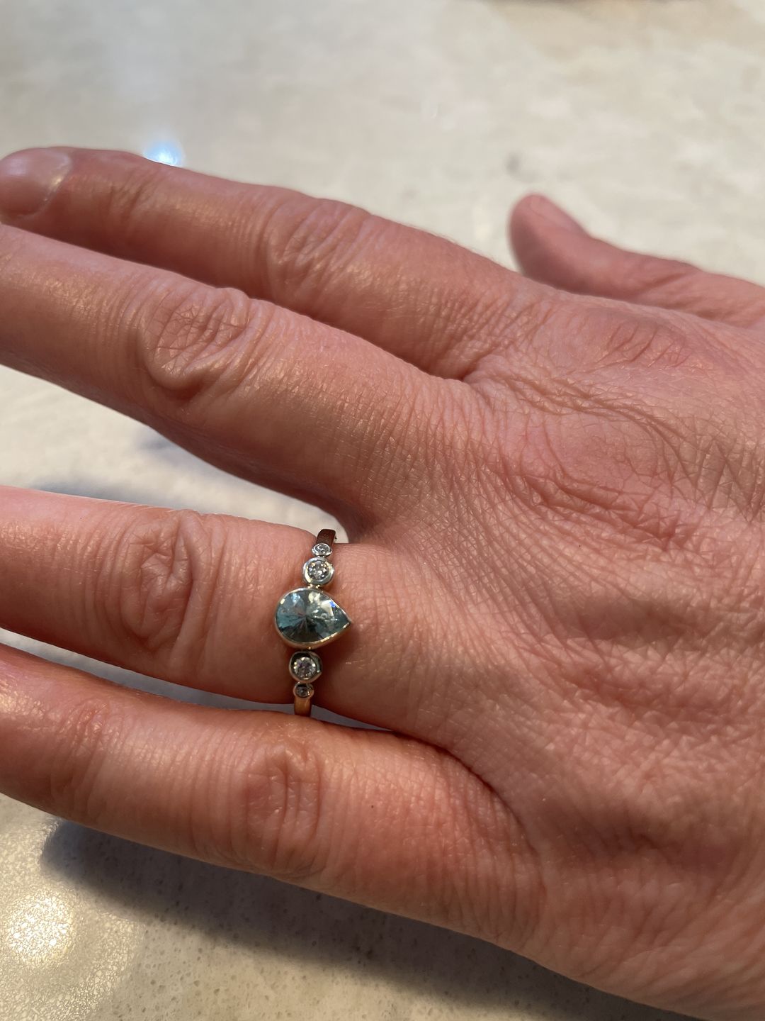 Customer photo review of Aquamarine and Diamond Multi Bezel Engagement Ring - Aquamarine Pear Ring